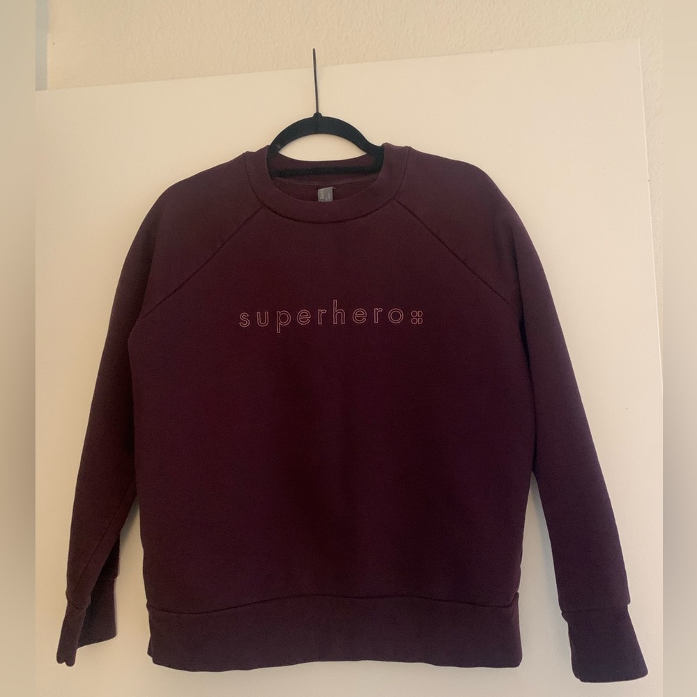 Sweaty Betty “superhero” maroon crewneck. Size small